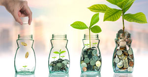 Coins stored in glass jars with growing plants illustrate Investing.